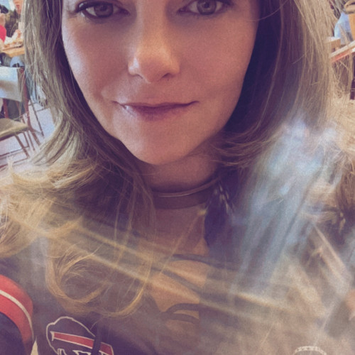 Elle K.