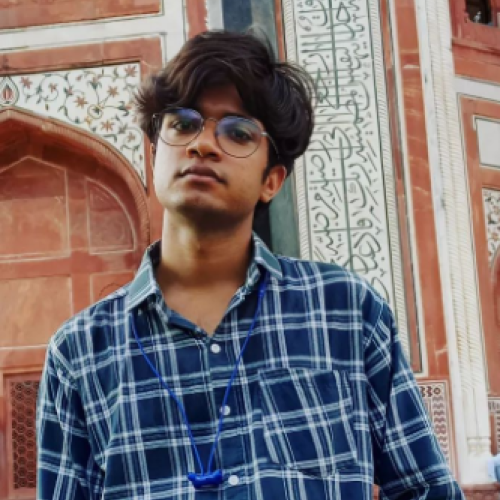 KARAN J.