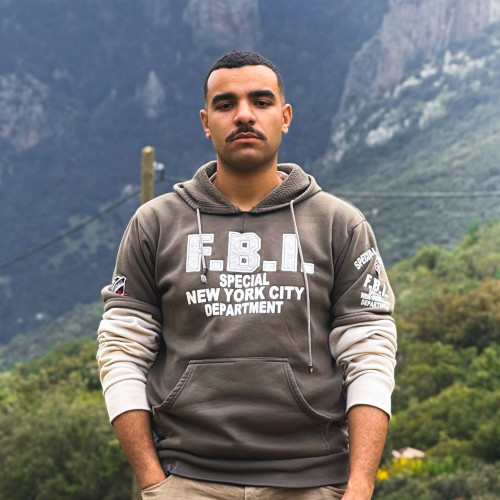 Hassan E.