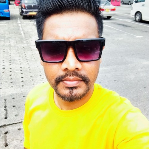 Dinesh T.
