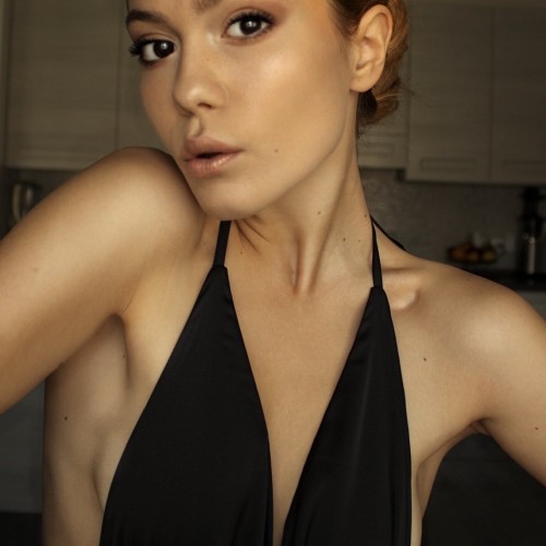 ALEXANDRA T.