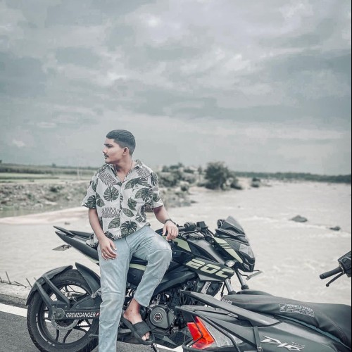 ASHOK M.