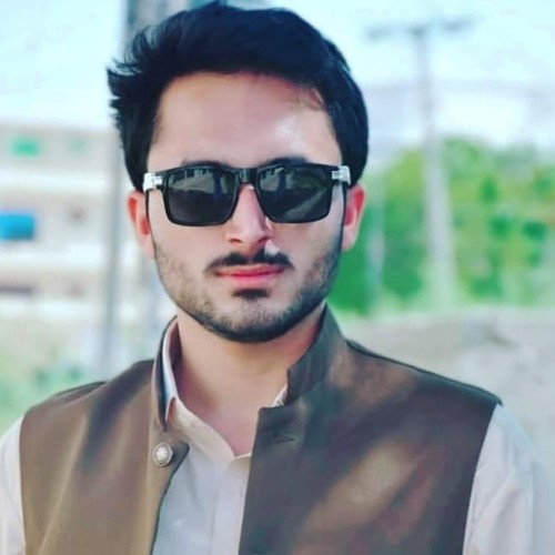 Mujahid K.