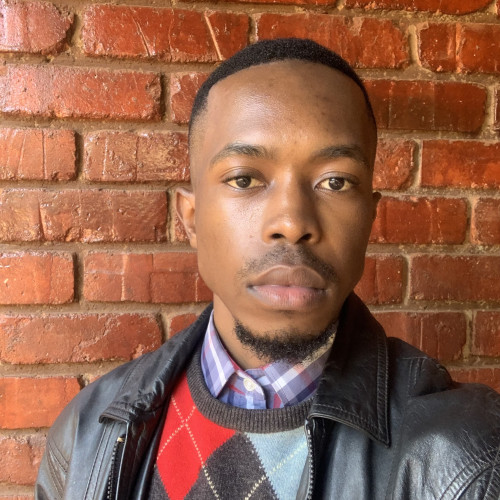 TYRONE M.