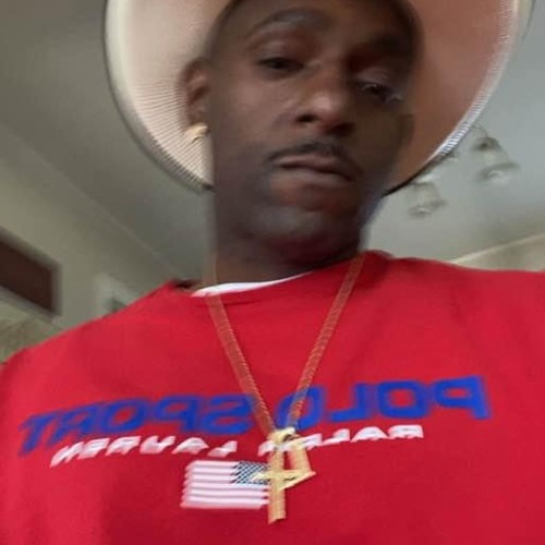 Travis E.