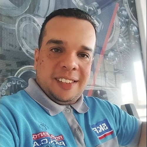 CARLOS L.