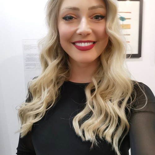 Lara I.