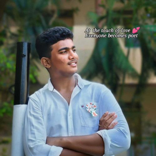 Dinesh B.