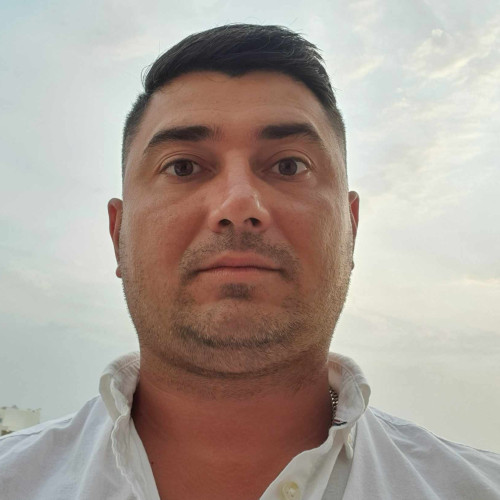 DRAGOS B.