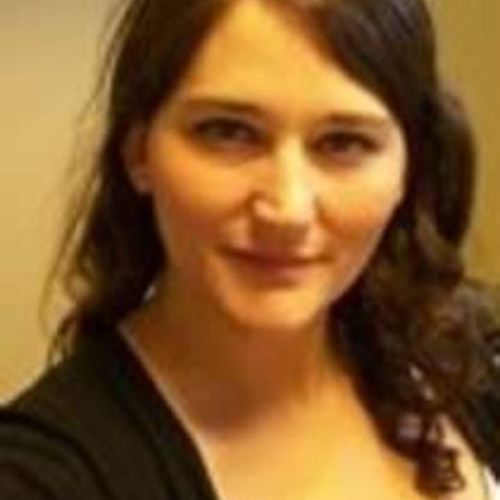 Laura E.