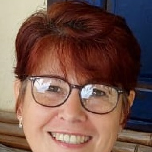 Elaine K.