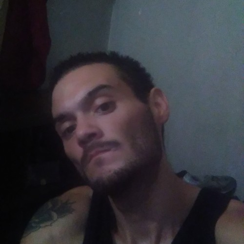 CARLOS T.