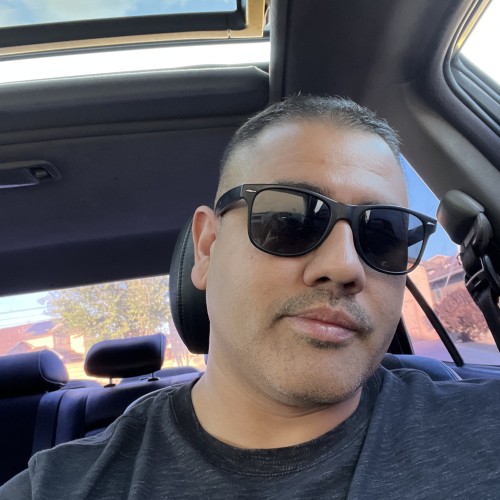 CARLOS B.