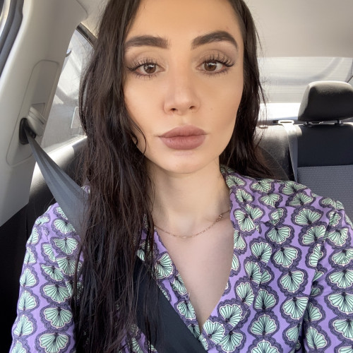 Laura E.