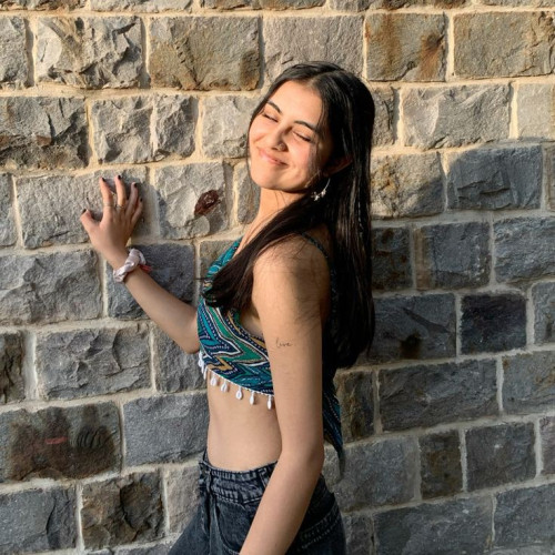 Rhea M.