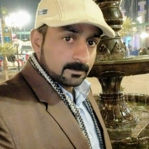 Mujahid K.