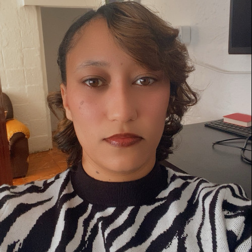 Meché  E. profile photo