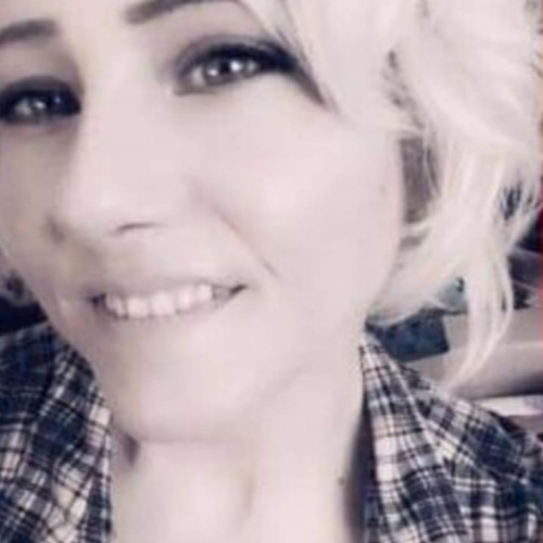 TINA M.