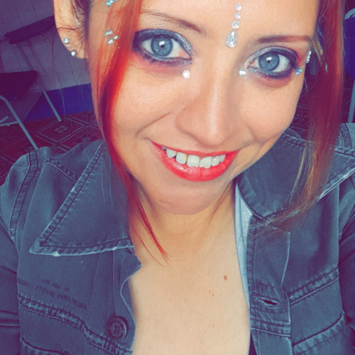 Laura E.