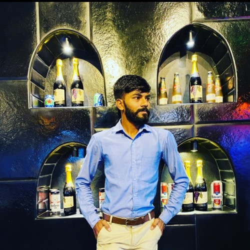 RAJESH M.