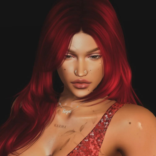 Elly E.