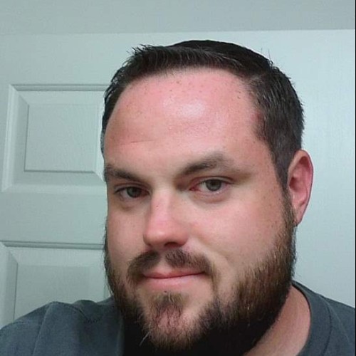 TRAVIS R.