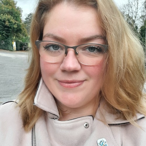 LARISA M.