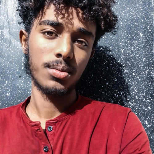 Amanuel J.