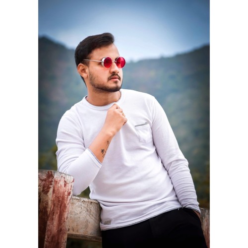 Naveen K.