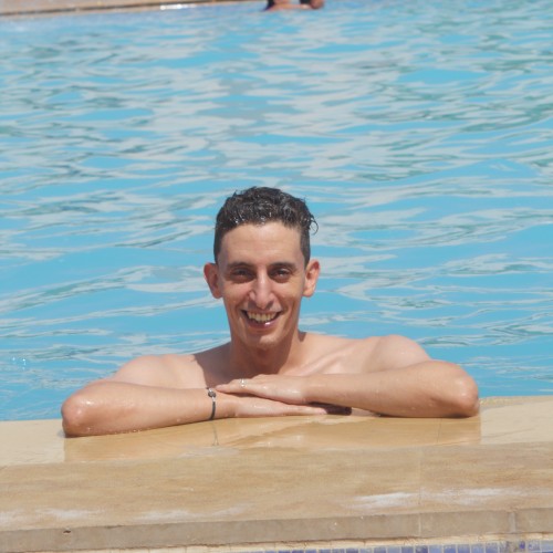 Issam E.