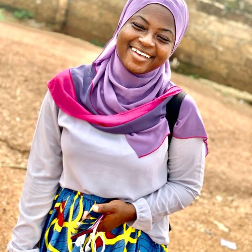 AMINA M.