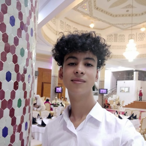 KAMAL E.