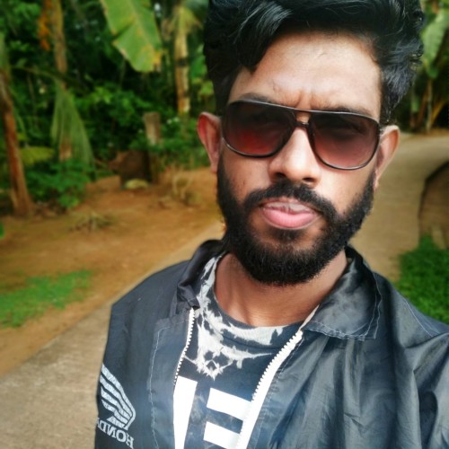 Dinesh M.