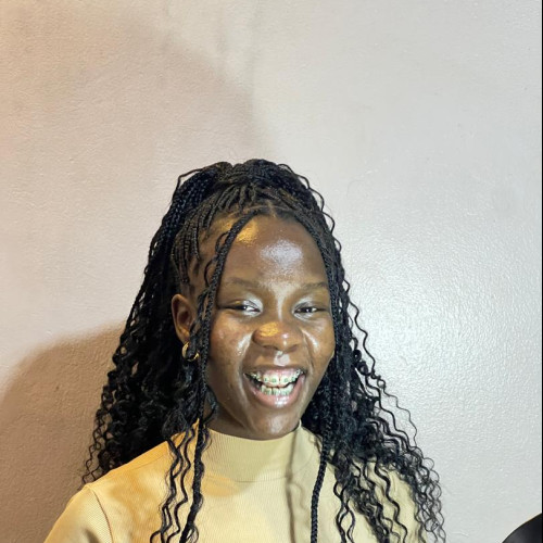 Evelyne  T. profile photo