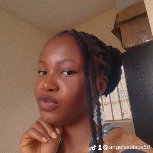 Angela  E.