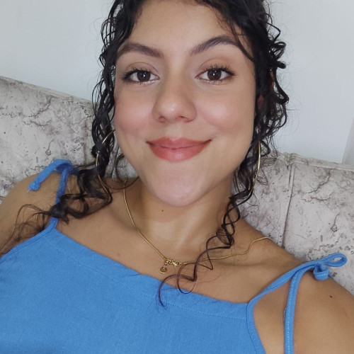 Laura E.