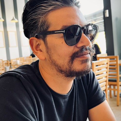 NIZAR E.