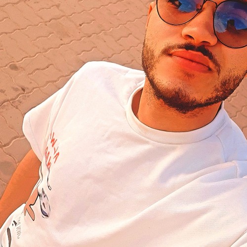 HASSAN E.