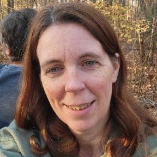 Laura E.