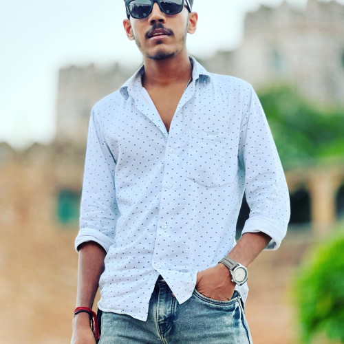 Nayan K.