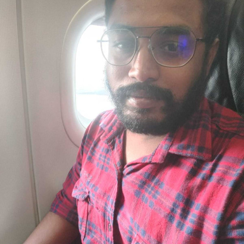 Madhu C.