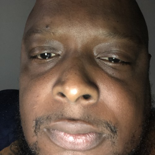 Travis  M.