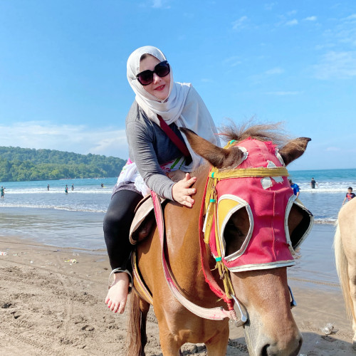 Siti G.