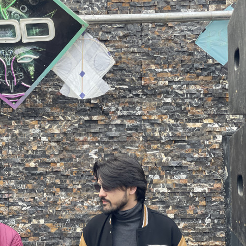 Azan K.