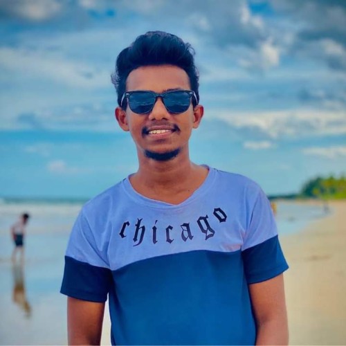 Tharu D.