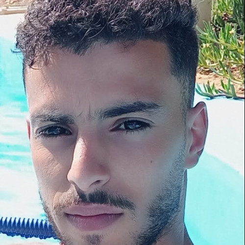 ALI B.