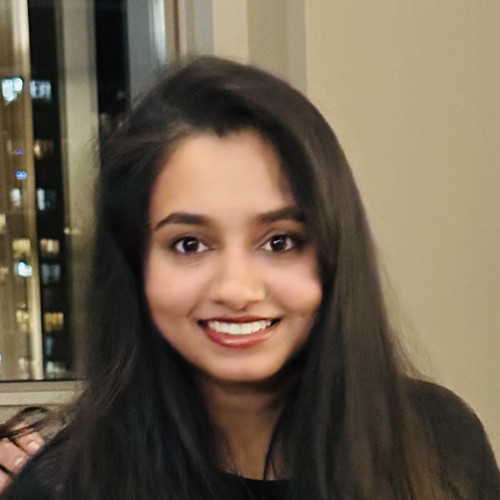 NISHA M.