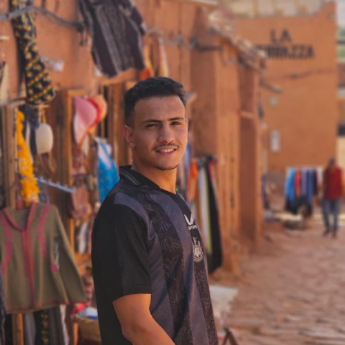 Amine E.