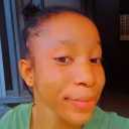 Joy E.