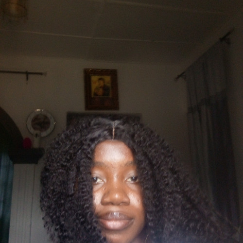Joy E.